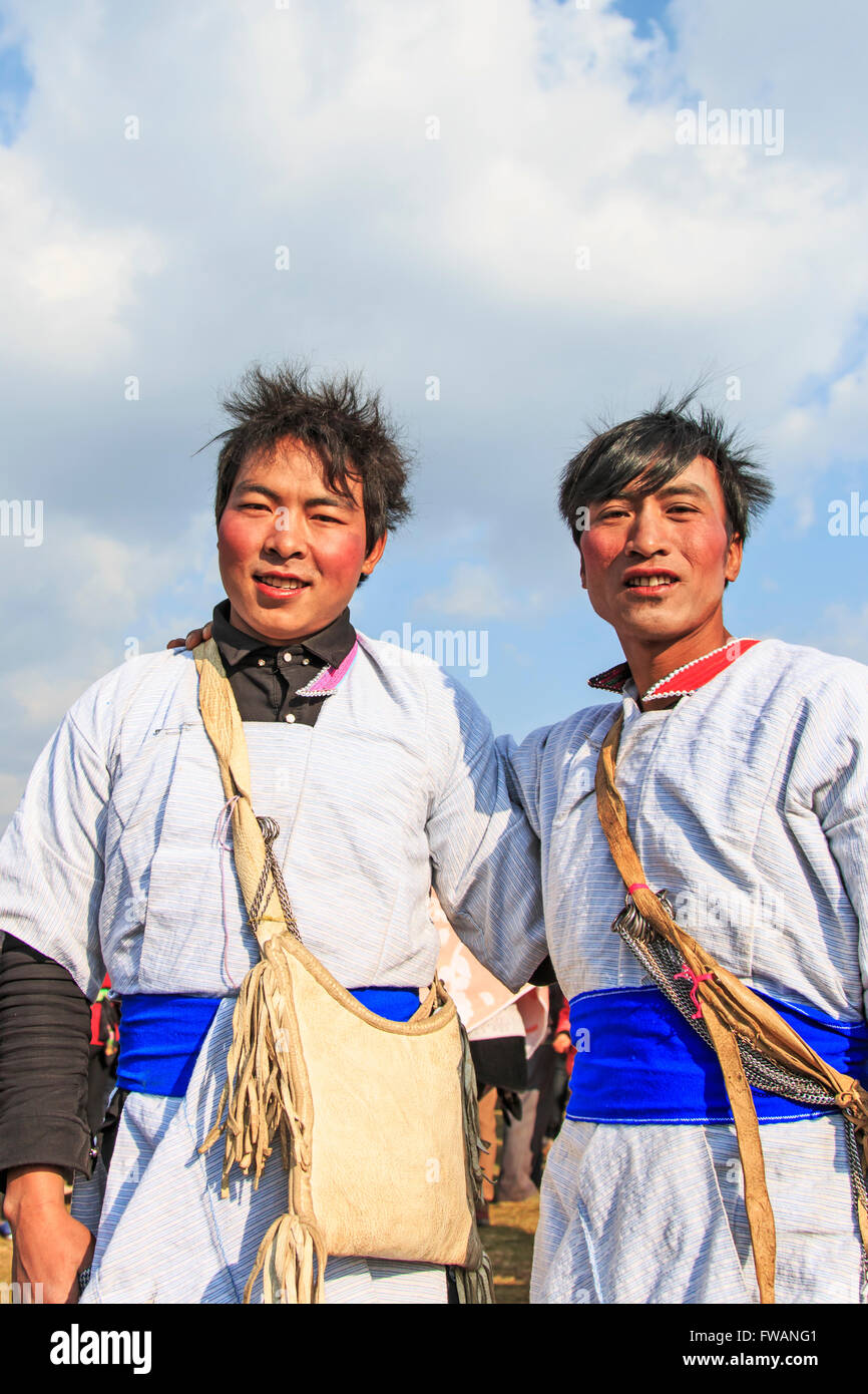 Heqing, China - March 15, 2016: Chinese men in ancient Bai Yi clothing during the Heqing Qifeng Pear Flower festival Stock Photo