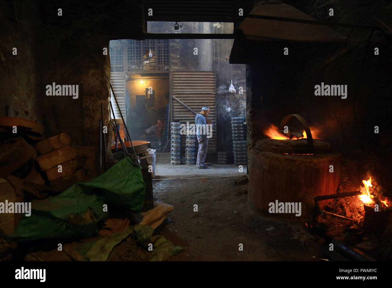 Alexandria, Egypt. 30th Mar, 2016. A worker takes a break at a scrap ...