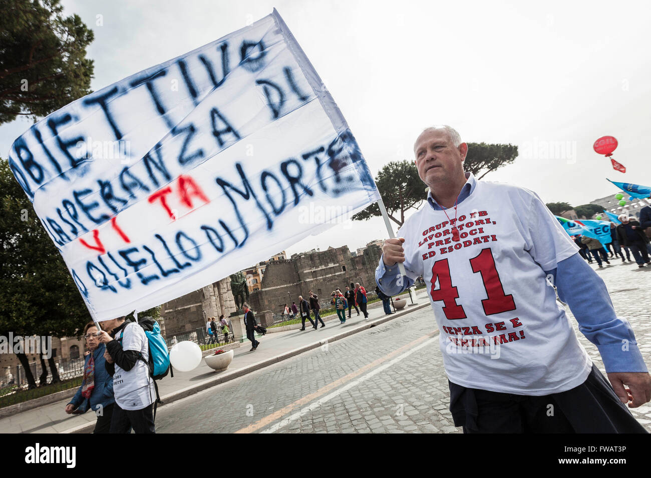 Rome, Italy. 02nd Apr, 2016. Members of three major Labor Unions of Italy (CGIL, CISL, UIL) take to the streets to protest against Fornero pension reform law in Rome, Italy. Thousands of demonstrators take part in an anti-government rally called by CGIL, CISL and UIL (the three Major Labor Unions of Italy), to ask for changes on pension law made by former Minister of Labor Elsa Fornero. Credit:  Giuseppe Ciccia/Pacific Press/Alamy Live News Stock Photo