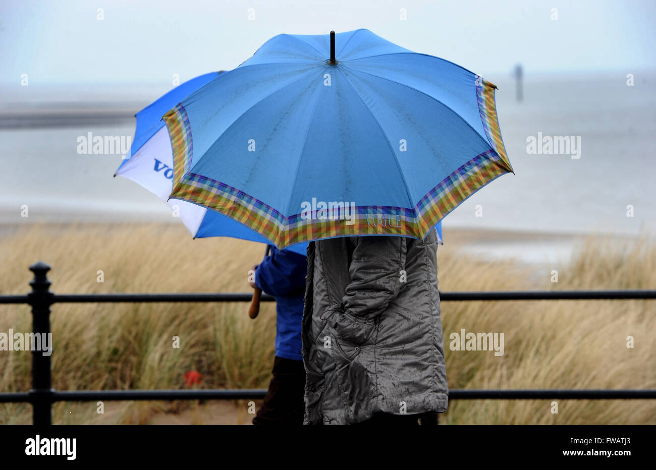 Fleetwood, Lancashire, UK. 2nd April, 2016. April showers put a dampener on the weekend walkers at Fleetwood, Lancashire. Picture by Paul Heyes, Saturday April 2, 2016. Credit:  Paul Heyes/Alamy Live News Stock Photo