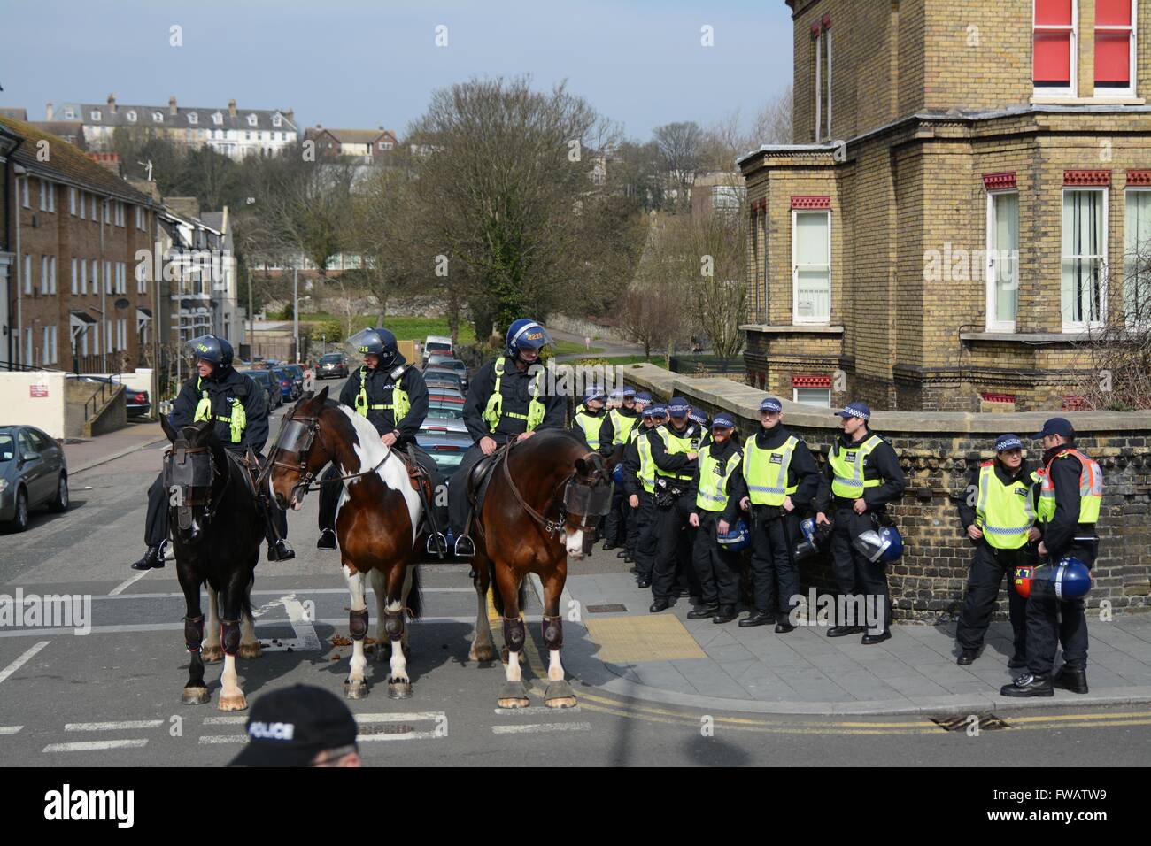 Dover, UK. 2nd April 2016. Clashes As Pro and Anti-refugee groups clash in Dover.  Mounted units and public order officers await the march. Credit: Marc Ward/Alamy Live News Stock Photo