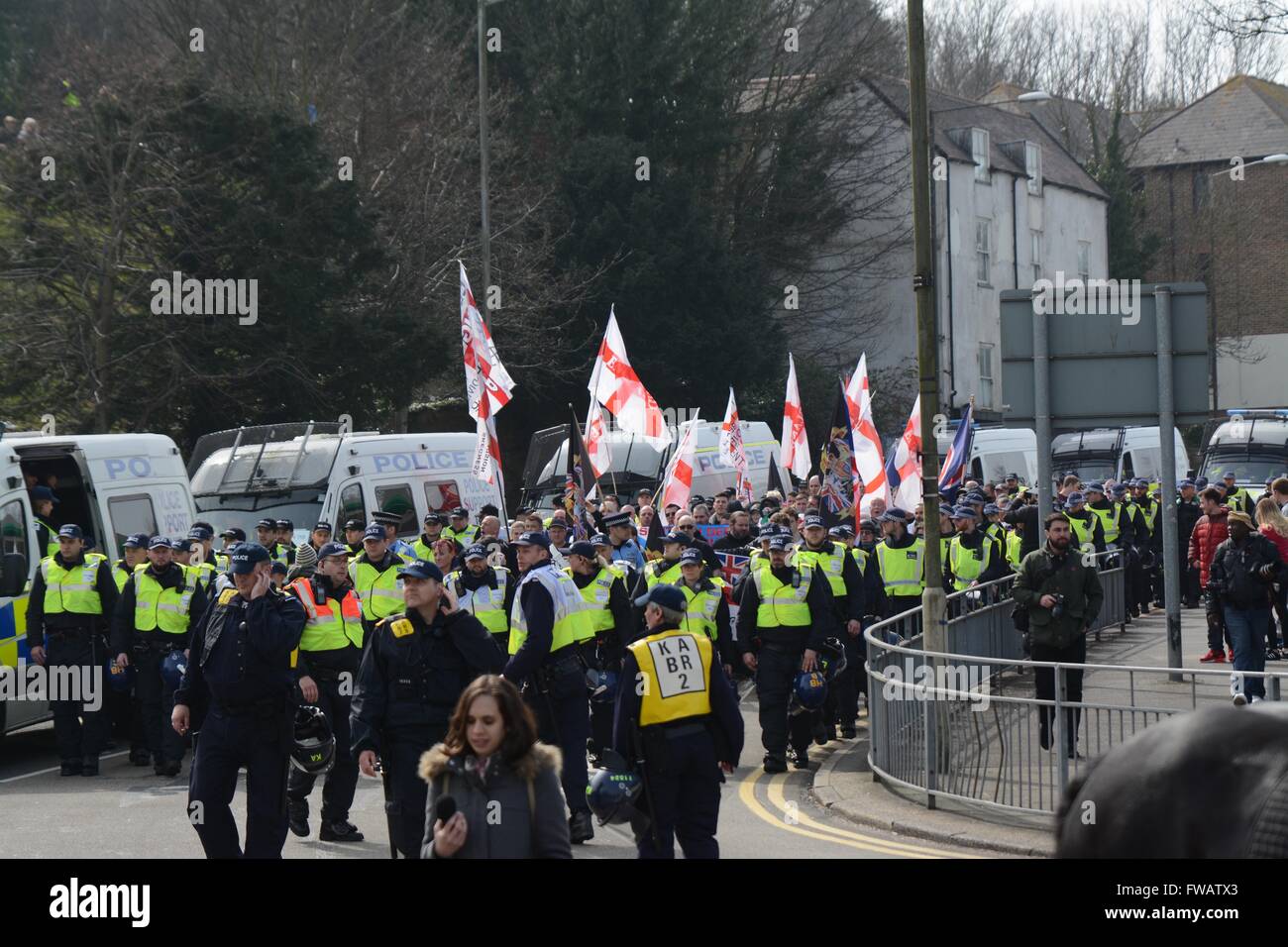 Dover, UK. 2nd April 2016. Clashes As Pro and Anti-refugee groups clash in Dover.  March starts as they're escorted by the Police. Credit: Marc Ward/Alamy Live News Stock Photo