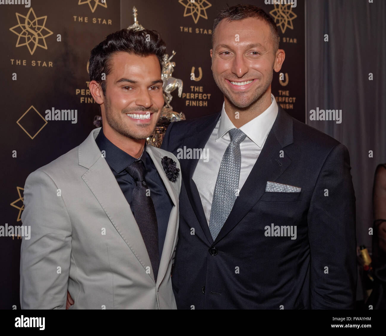 Sydney, Australia. 02nd Apr, 2016. Partners Ryan Channing (L) and Ian Thorpe (R) pose during a photo call during The Championships Day at Royal Randwick features the world's richest horse races in Sydney, Australia. Ian Thorpe revealed he was gay in an interview with Sir Michael Parkinson in 2014. © Hugh Peterswald/Pacific Press/Alamy Live News Stock Photo