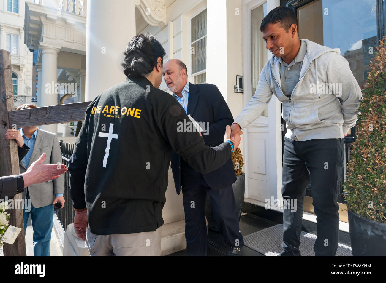 London, UK. 2th April, 2016.  Pakistani High Commission staff talk with a Pakistani Christian who is deliving a petition forllwing the Lahore Easter bombing. Christians want and end to the blasphemy laws and for the protection of all religious minorities in Pakistan.Peter Marshall/Alamy Live News Stock Photo