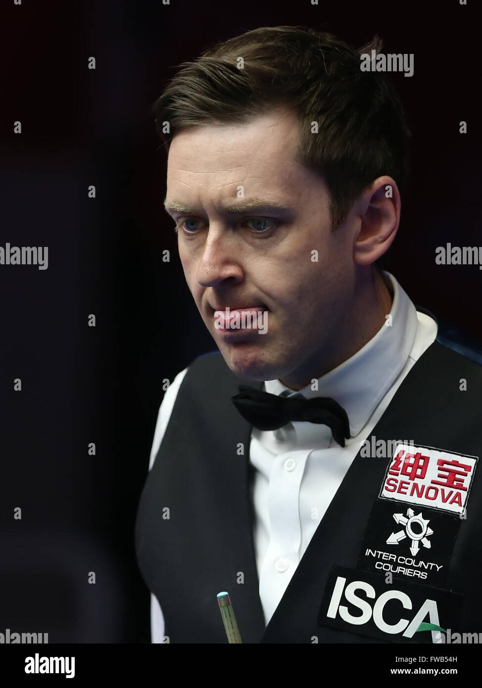 Beijing, China. 3rd Apr, 2016. Ricky Walden of England ponders during the final of the 2016 World Snooker China Open Tournament against his compatriot Judd Trump in Beijing, capital of China, April 3, 2016. Credit:  Xu Zijian/Xinhua/Alamy Live News Stock Photo
