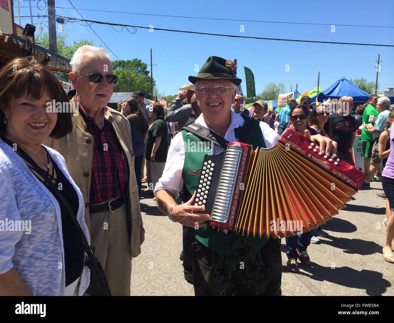 Houston, USA. 2nd Apr, 2016. An artist plays accordion in the street during the German Hergitage