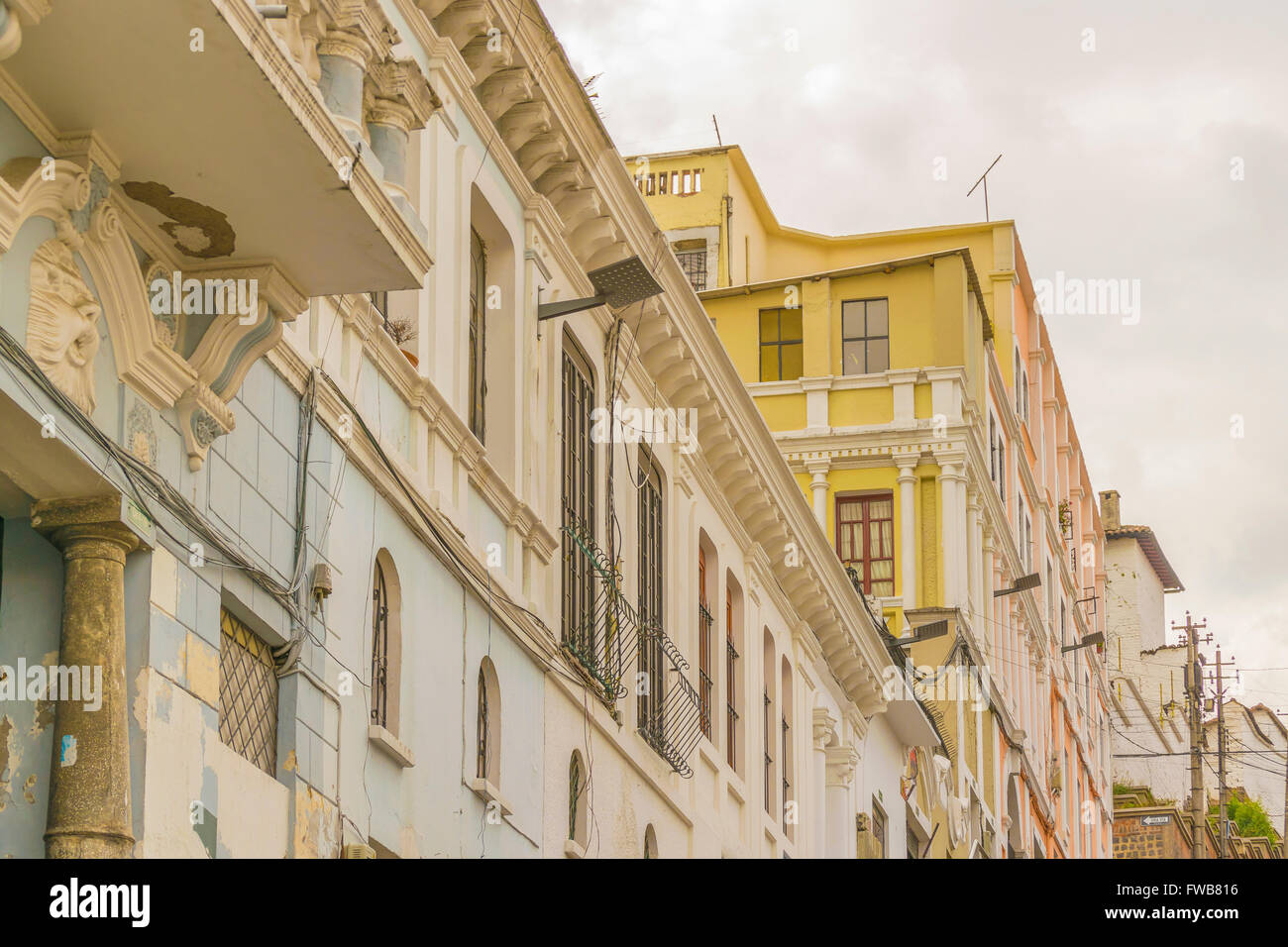Low angle view of colonial and classic style buildings at the historic center of Quito in Ecuador. Stock Photo
