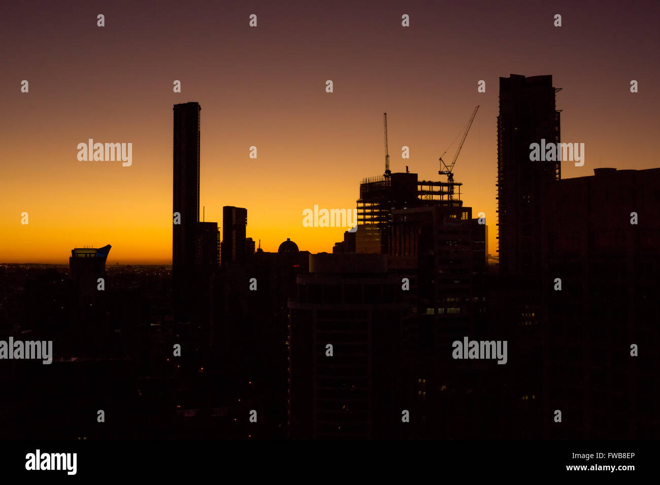 Brisbane skyline at dawn, buildings in silhouette Stock Photo