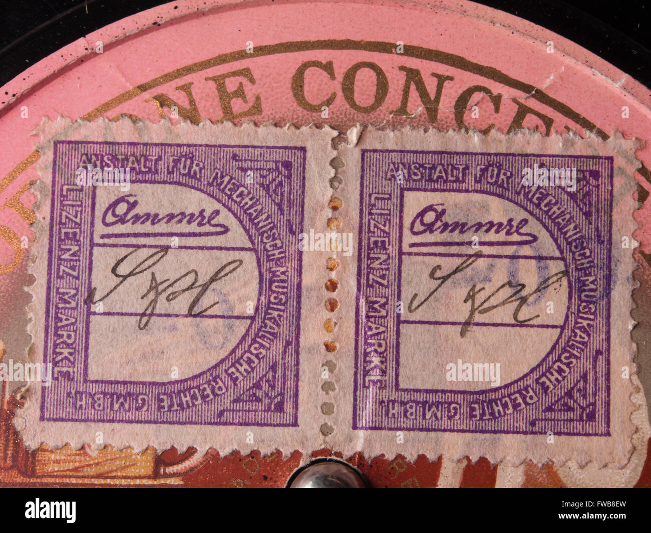 German copyright license stamps ,Mecanish Musikalishe Rechte Lizenz marke , on an old record Stock Photo