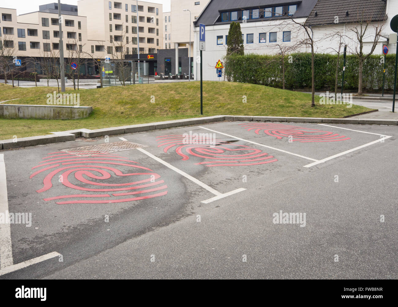 Public parking spaces with fingerprint decoration, Stavanger Norway, art installation (unknown artist) Stock Photo