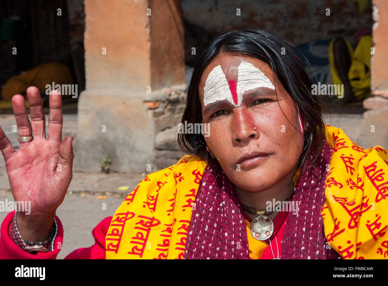 Nepal, Pashupatinath.  Female Hindu Sadhu (Ascetic).  She wears a nose pin in her nostril. Stock Photo