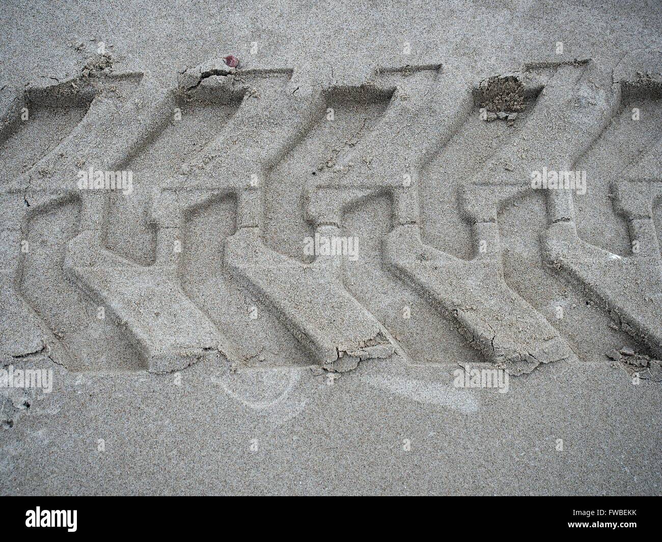 imprint tyre on sand Stock Photo