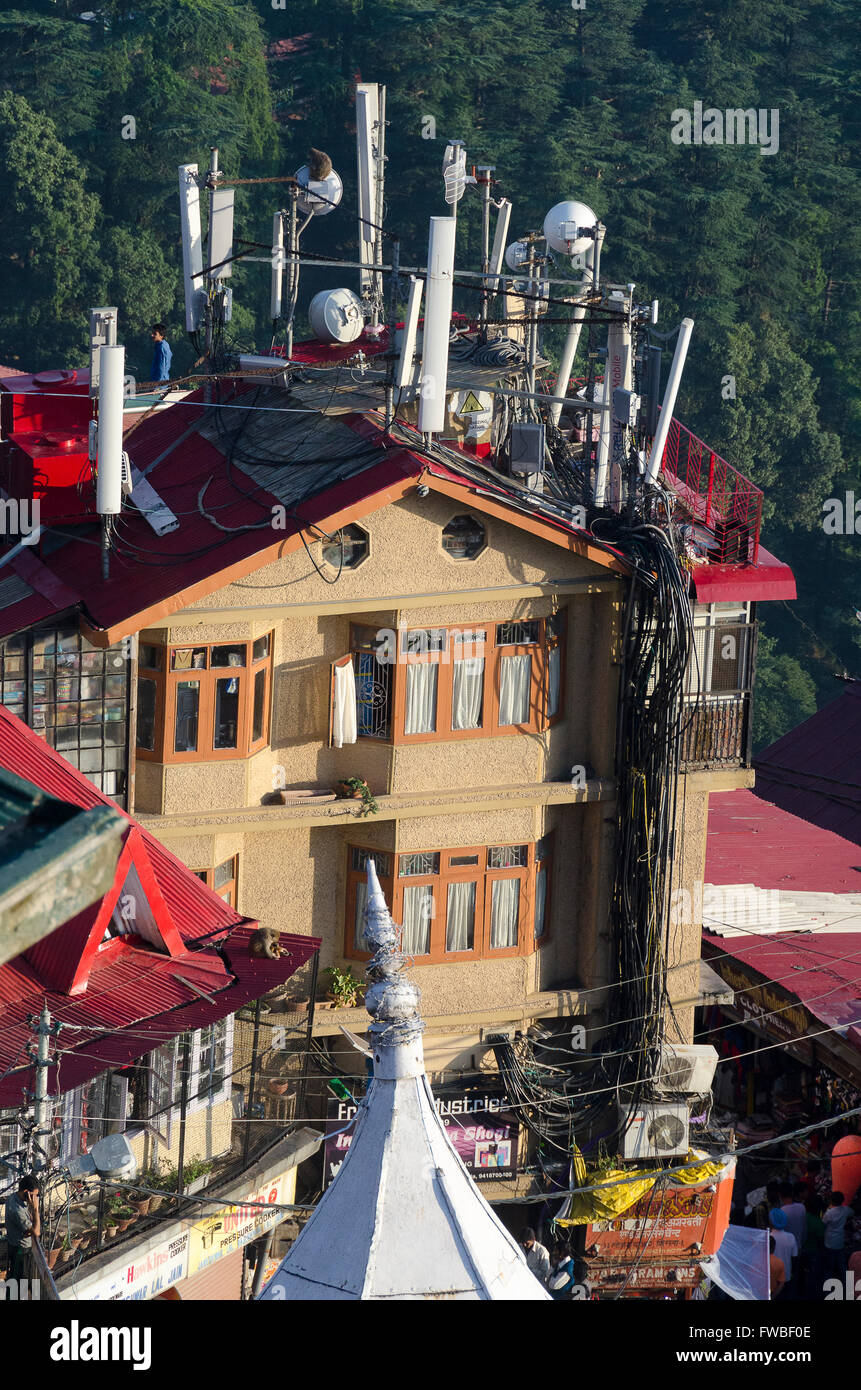Building with cell phone antennae, Shimla, Himachal Pradesh, India, Stock Photo