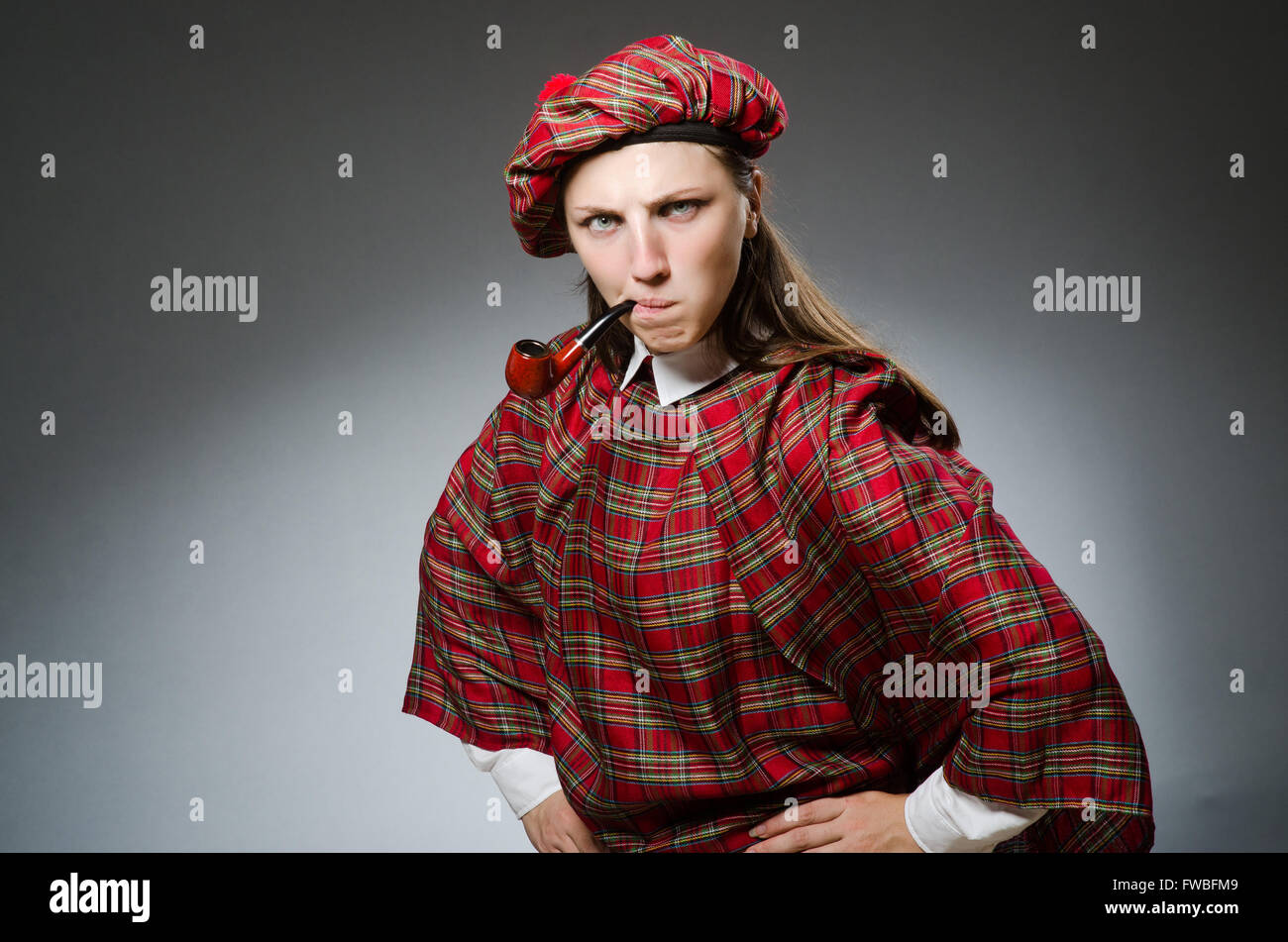 Woman wearing traditional scottish clothing Stock Photo