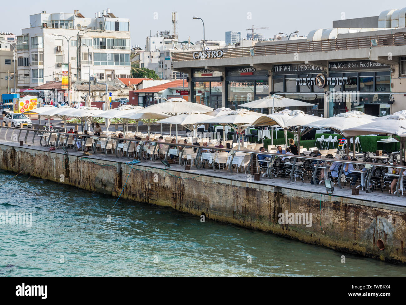 White Pergola restaurant and Castro store in Tel Aviv Port neighbourhood, Tel Aviv city in Israel Stock Photo
