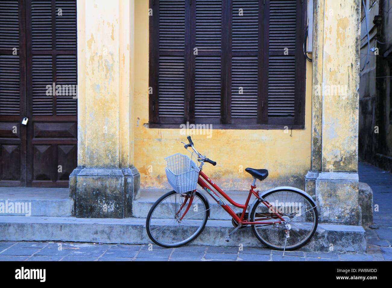 Bicycle in front of a colonial style house, Hoi An, Vietnam, Asia Stock ... - Bicycle In Front Of A Colonial Style House Hoi An Vietnam Asia FWBMDD