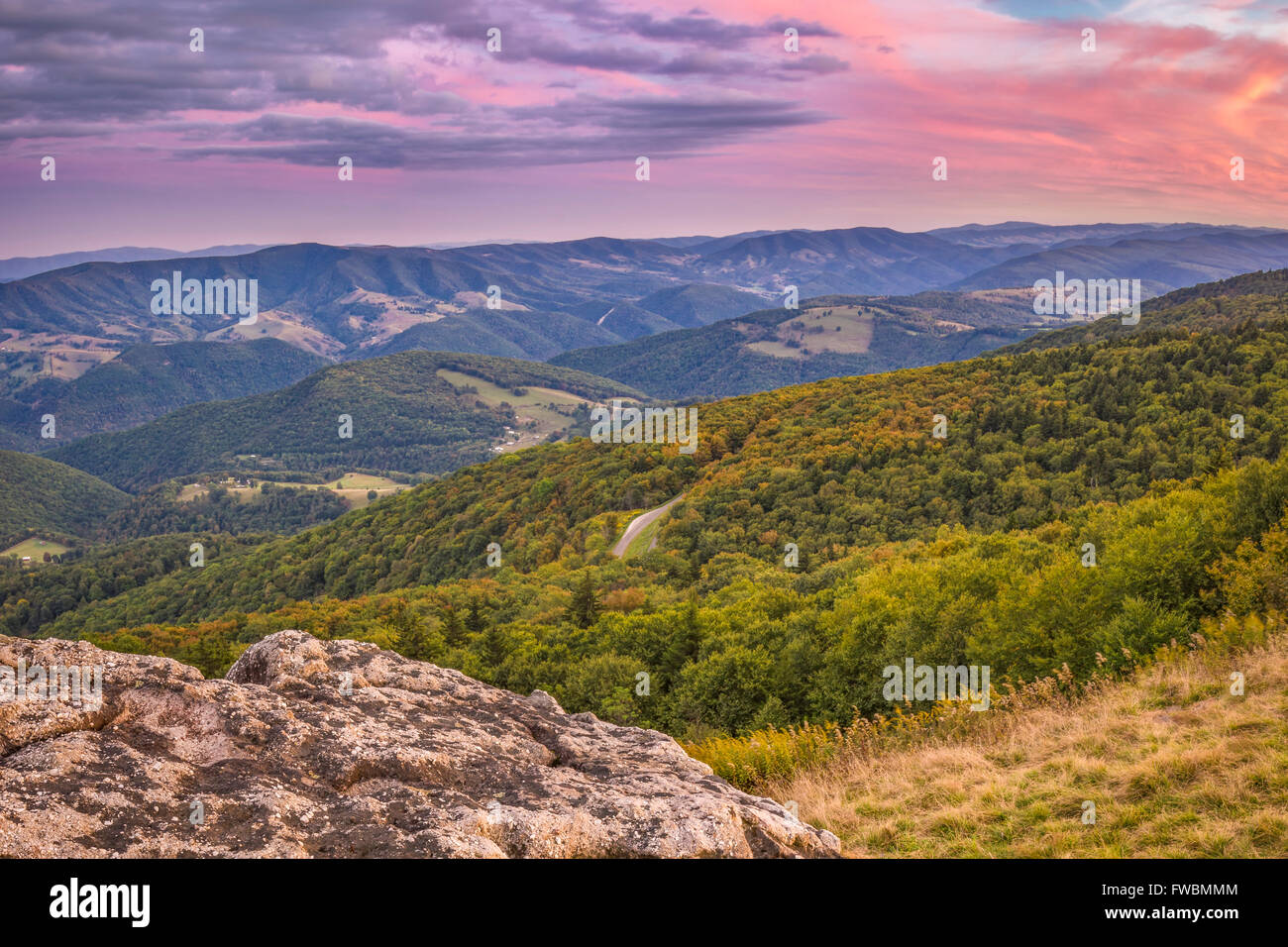 Twilight begins to settle over the gently rolling hills and mountains from atop Spruce Knob in West Virginia. Stock Photo