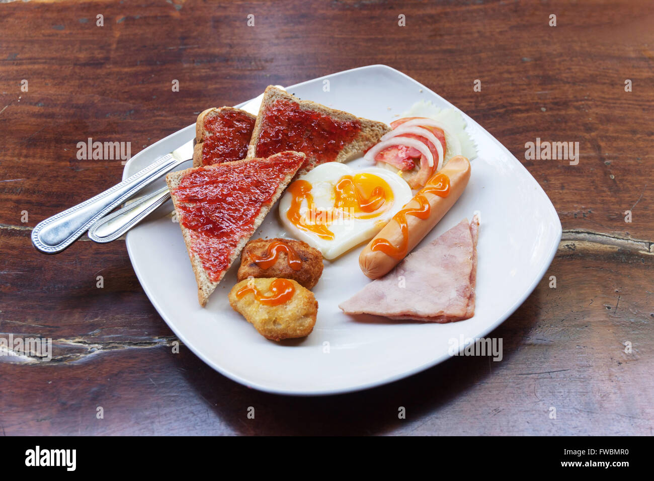 America breakfast and salads on wood table in morning Stock Photo
