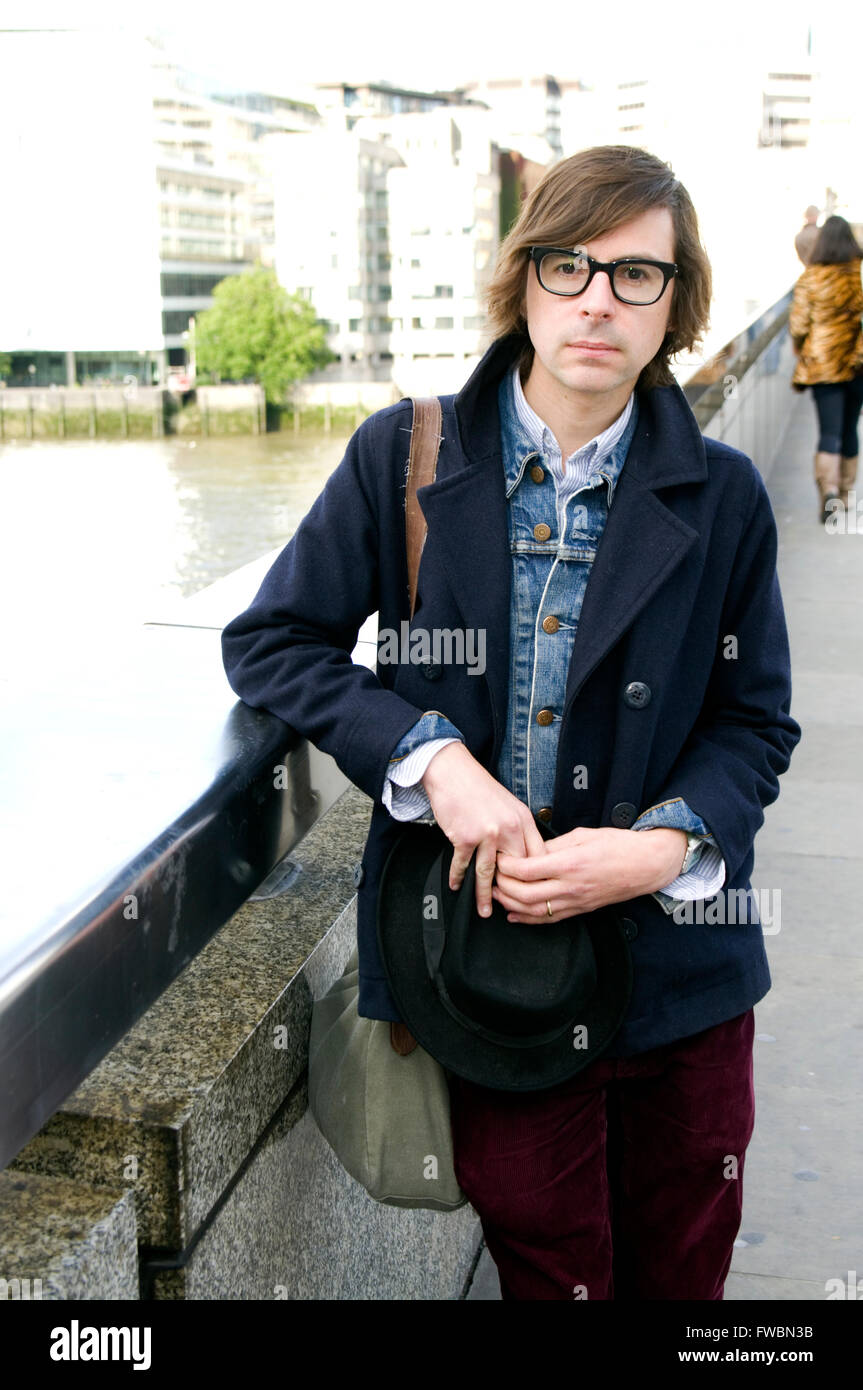 Portrait of author Travis Elborough on London Bridge. Travis is a ...