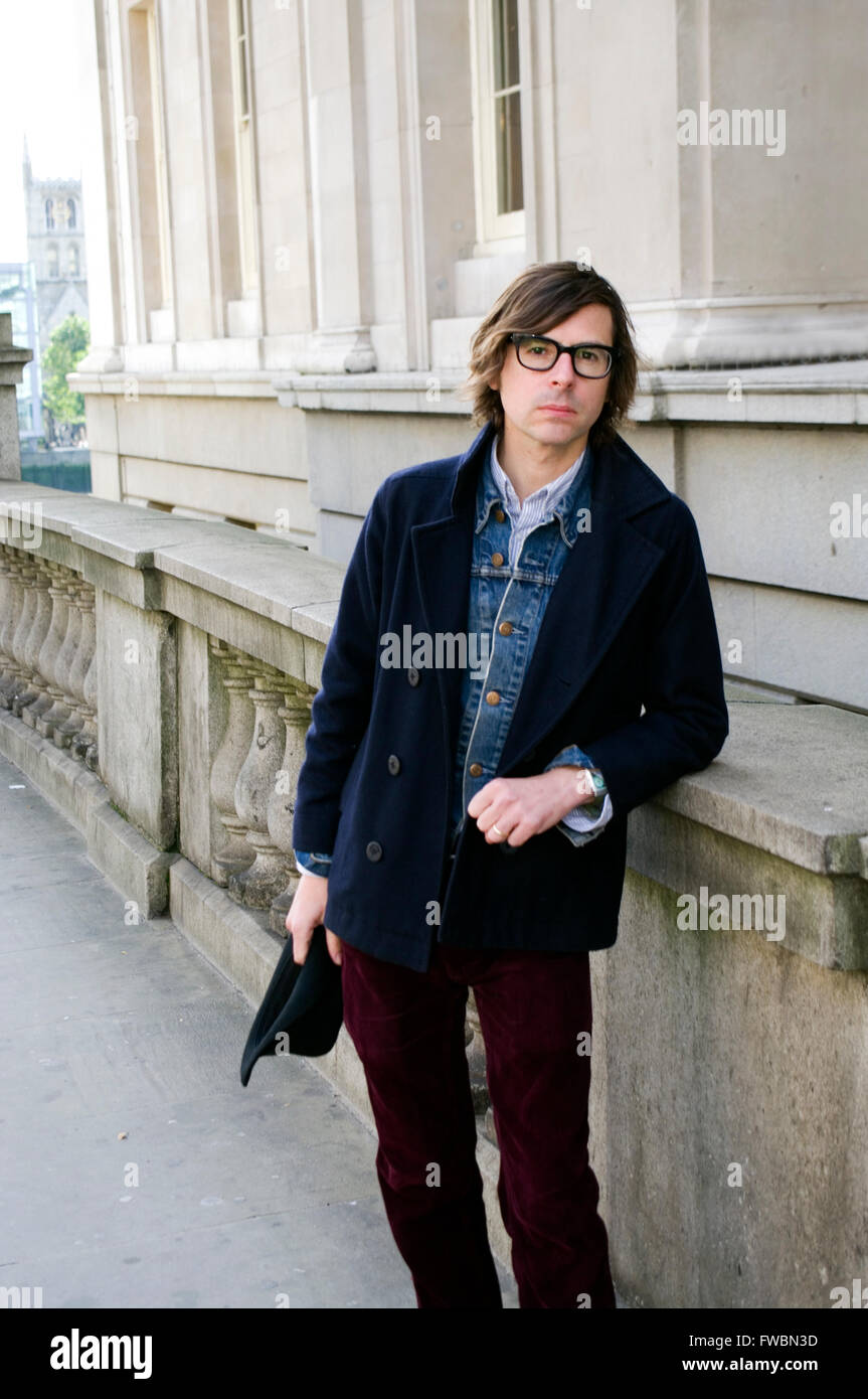 Portrait of author Travis Elborough on London Bridge. Travis is a ...