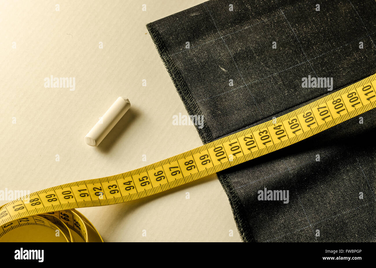 still life with a tape measure a chalk and tissue Stock Photo Alamy