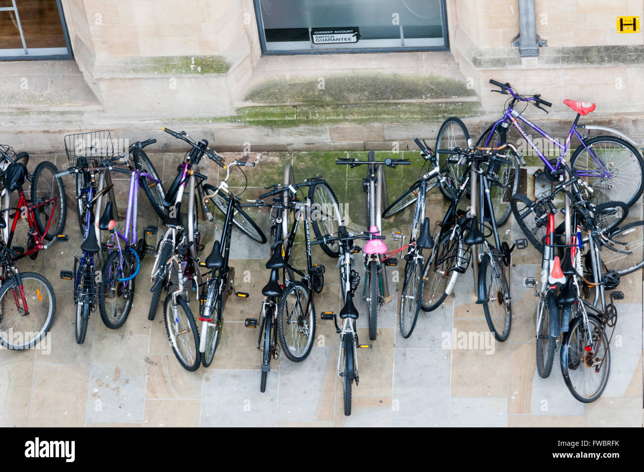 A jumble of parked bicycles in Oxford, viewed from above. Stock Photo