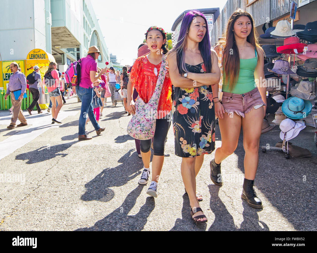 Candid photograph of Asian girls, at ekka fair, brisbane Stock Photo