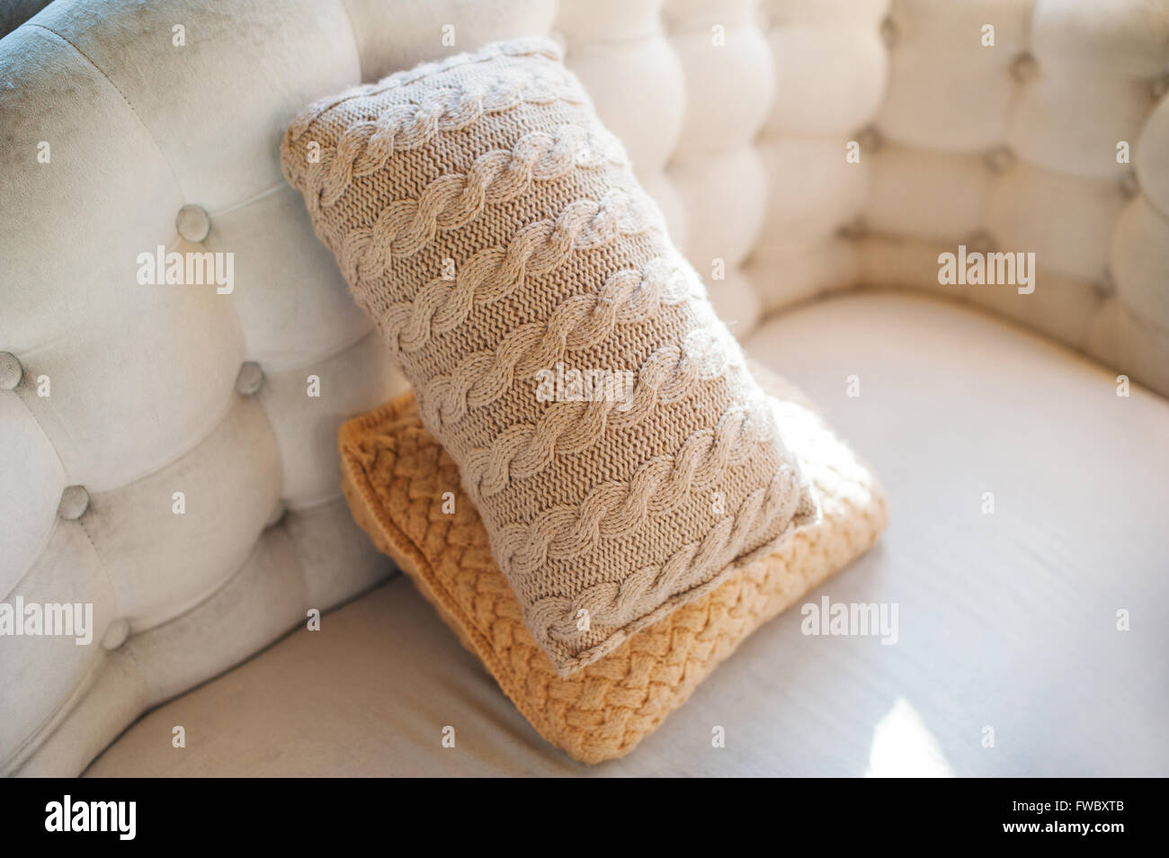 two pillows lying on the couch close up Stock Photo Alamy