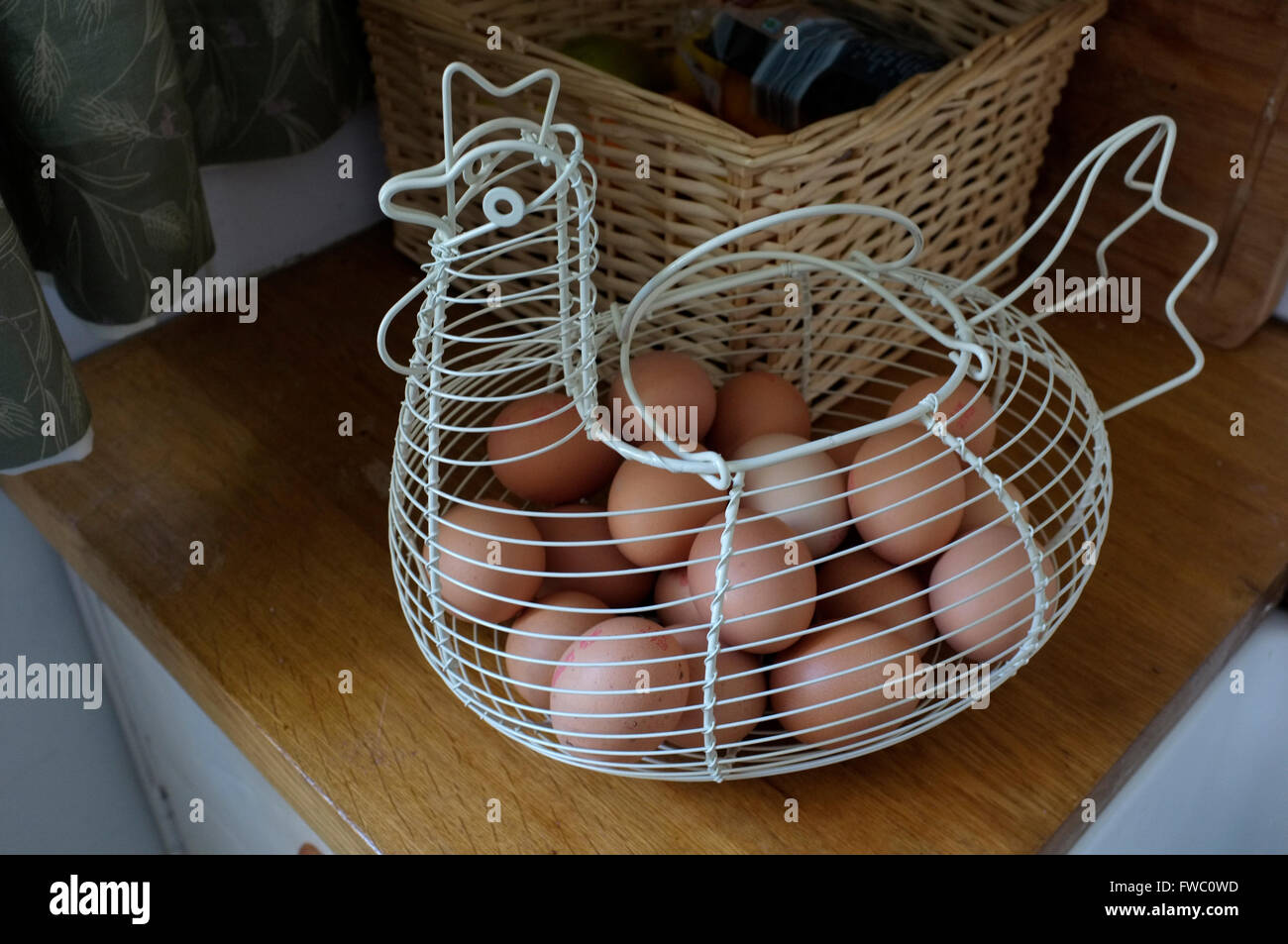 chicken egg wire carrying basket in east kent uk april 2016 Stock Photo