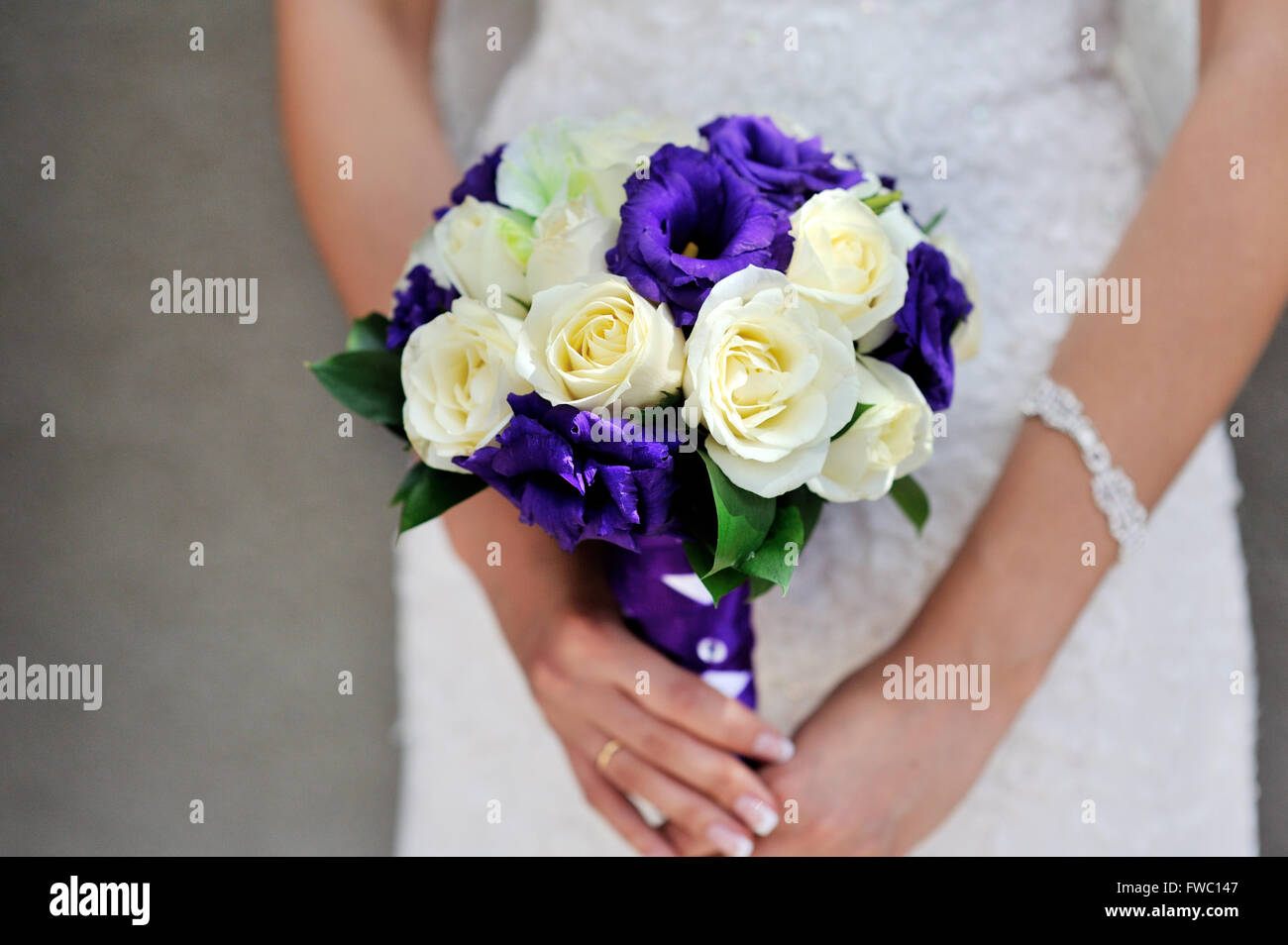 Bride hold wedding bouquet with white and lilac roses Stock Photo Alamy