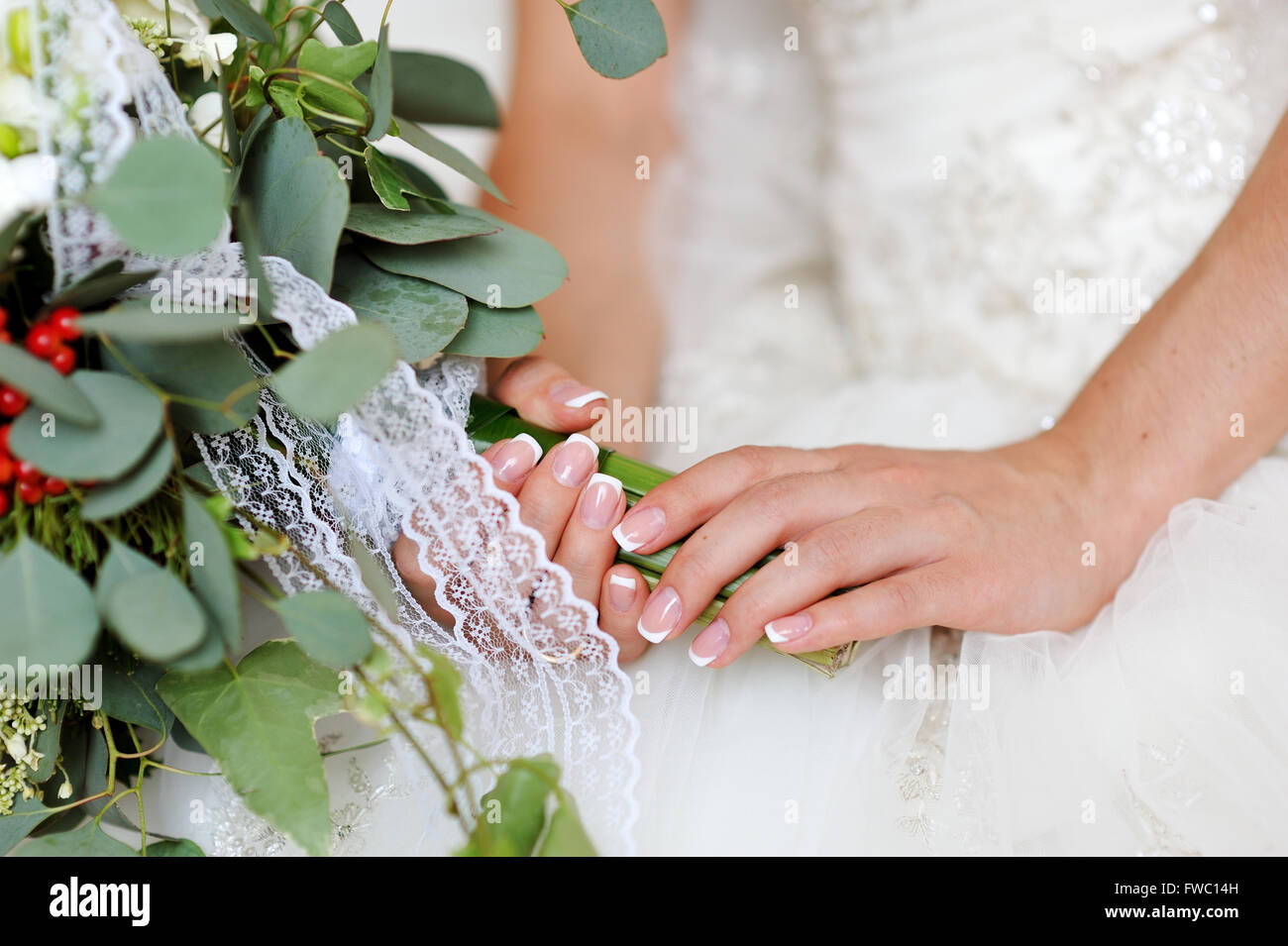 bride holding wedding bouquet with white flowers Stock Photo - Alamy