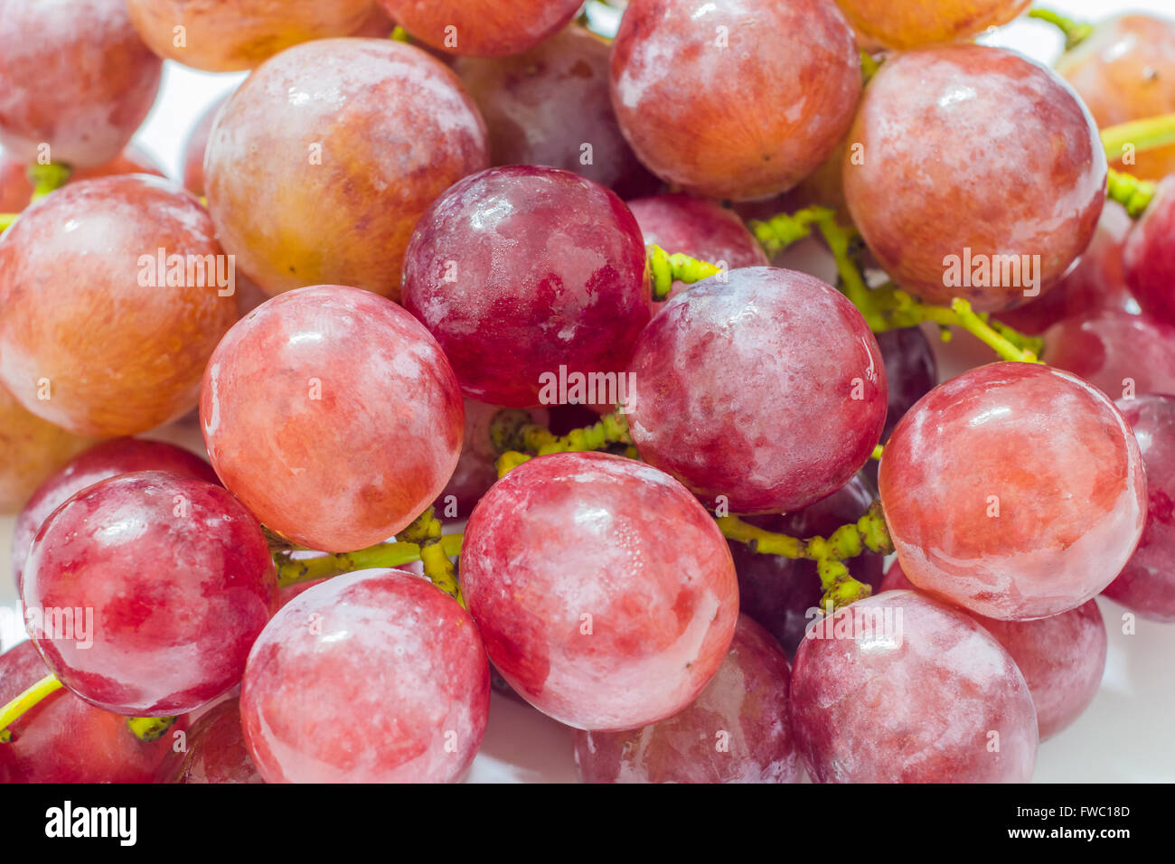 A bunch of fresh red grapes Stock Photo