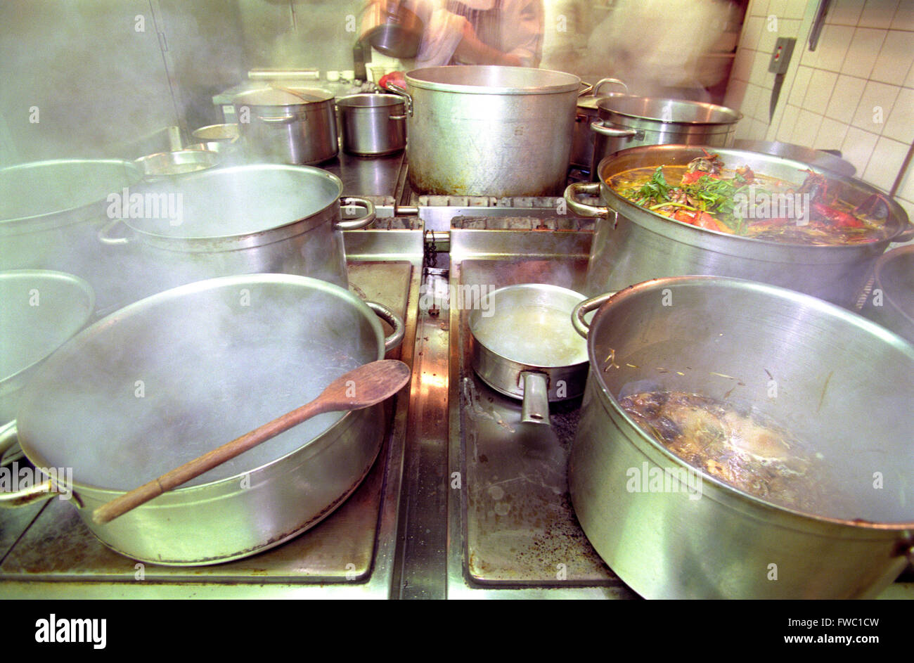 Industrial sized pots and pans in a restaurant kitchen Stock Photo Alamy