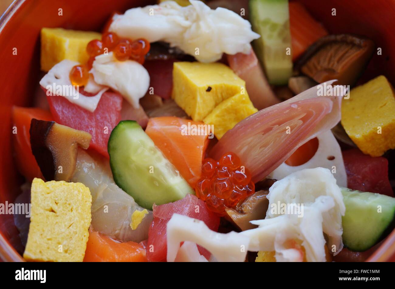 Bowl of chirashi sushi with mixed raw fish and salmon roe over rice Stock Photo Alamy