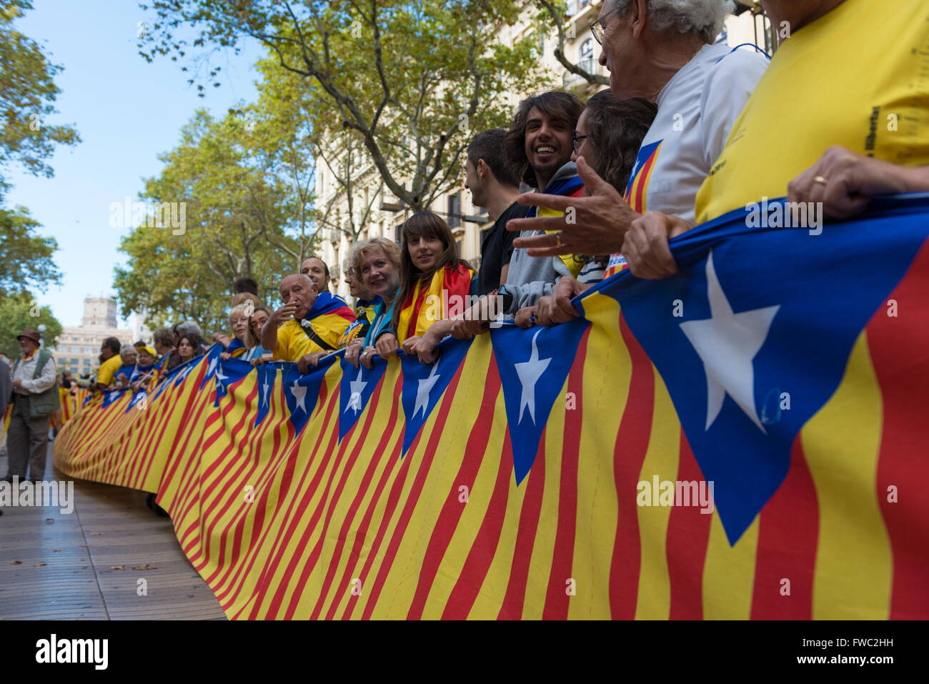 The Long Flag At National Day of Catalonia in Barcelona Stock Photo
