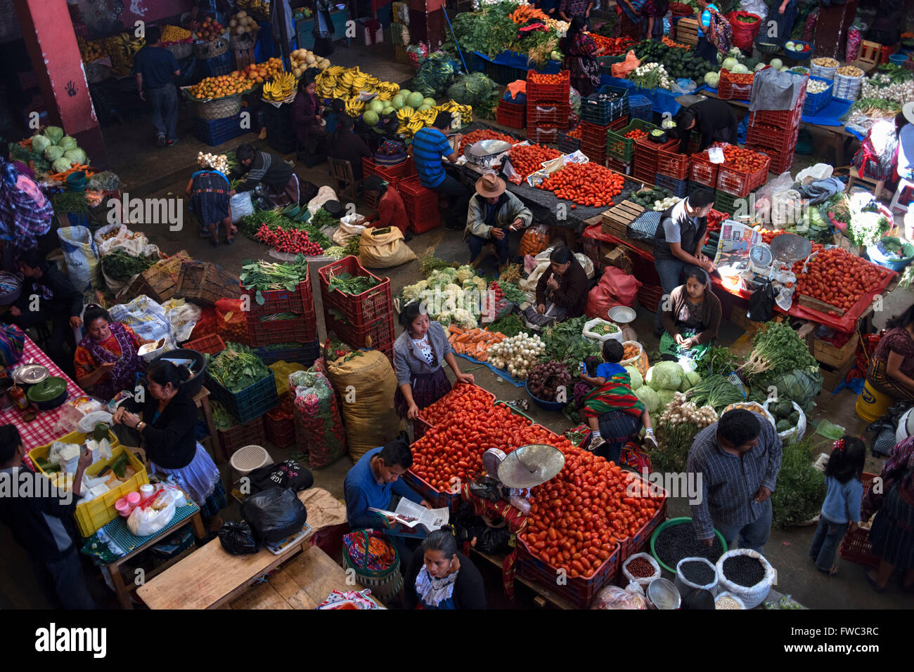 Indoor vegetable and fruit market, Chichicastenango, Guatemala, Central America Stock Photo