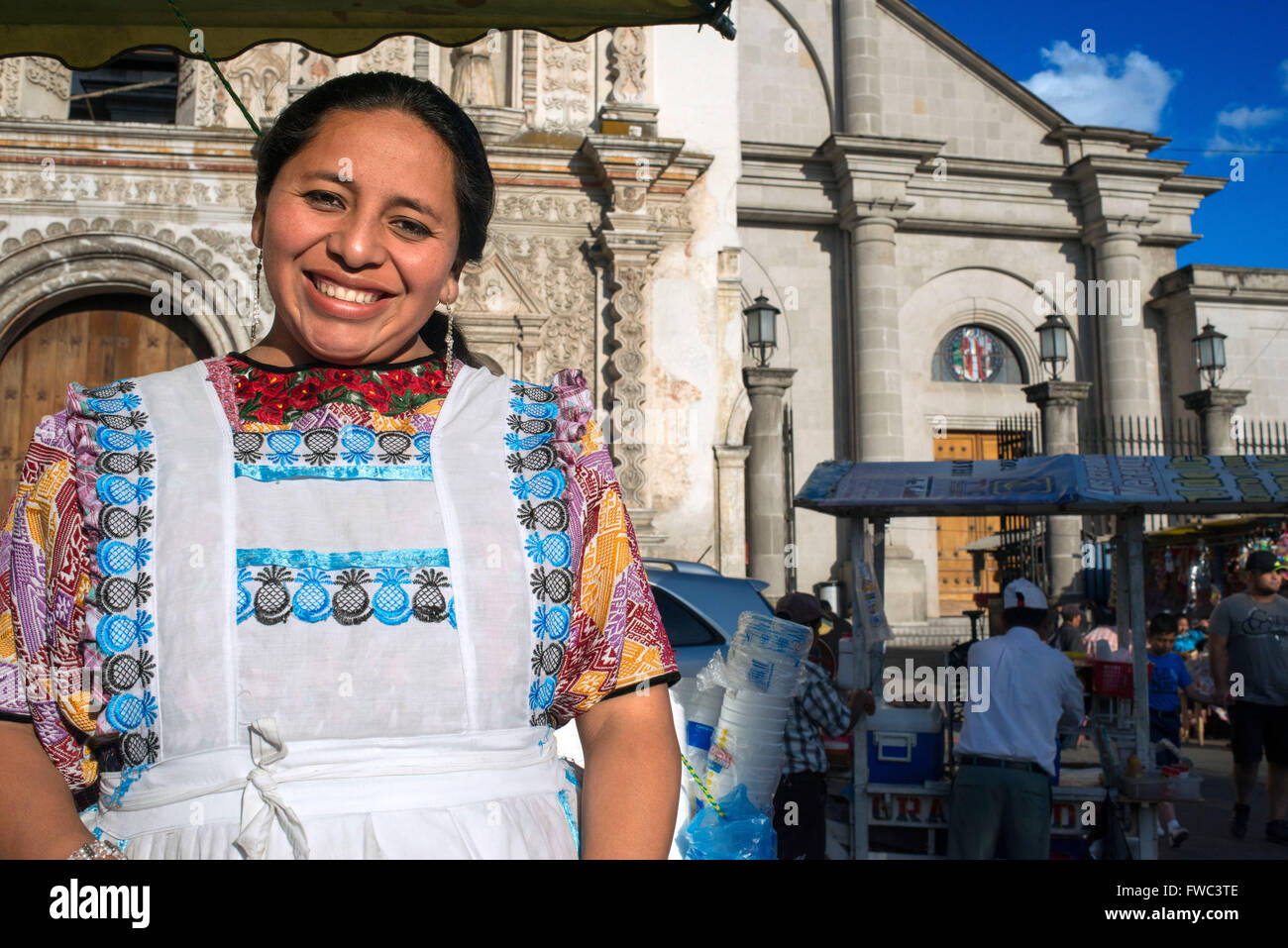 Ice cream woman seller in America Central Park, Quetzaltenango city Guatemala. Stock Photo