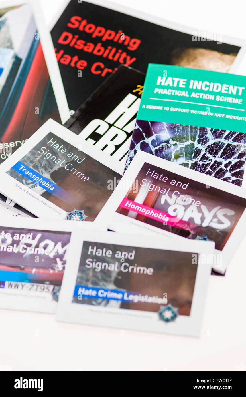 Leaflets from the PSNI advising people how to handle hate and signal crimes including transphobia, homophobia, and racial hatred Stock Photo