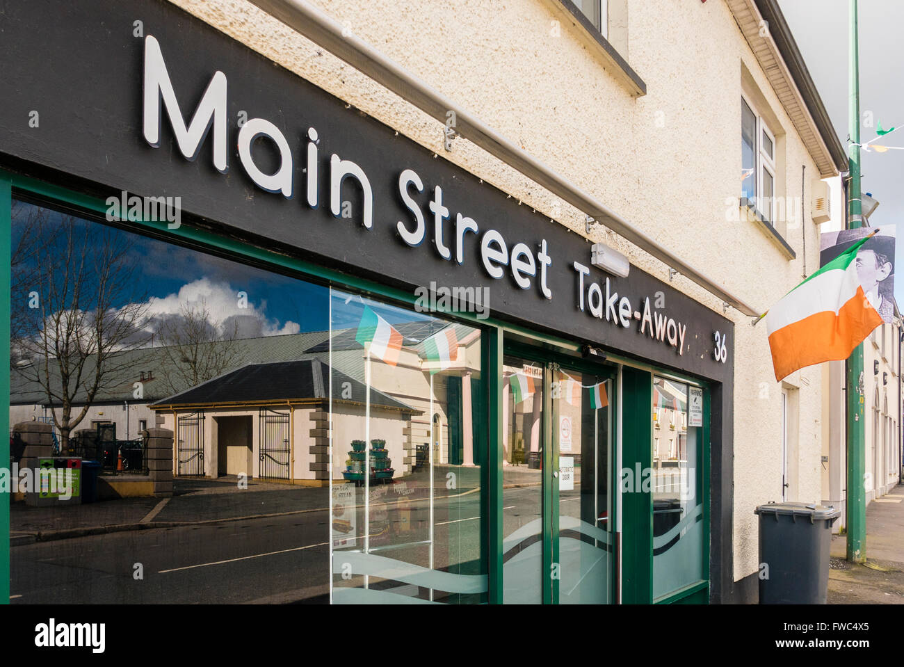 Main Street Take-Away shop in an Irish town village. Stock Photo