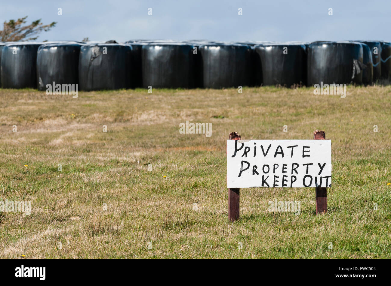 Sign in a field saying 'Private property.  Keep out' Stock Photo