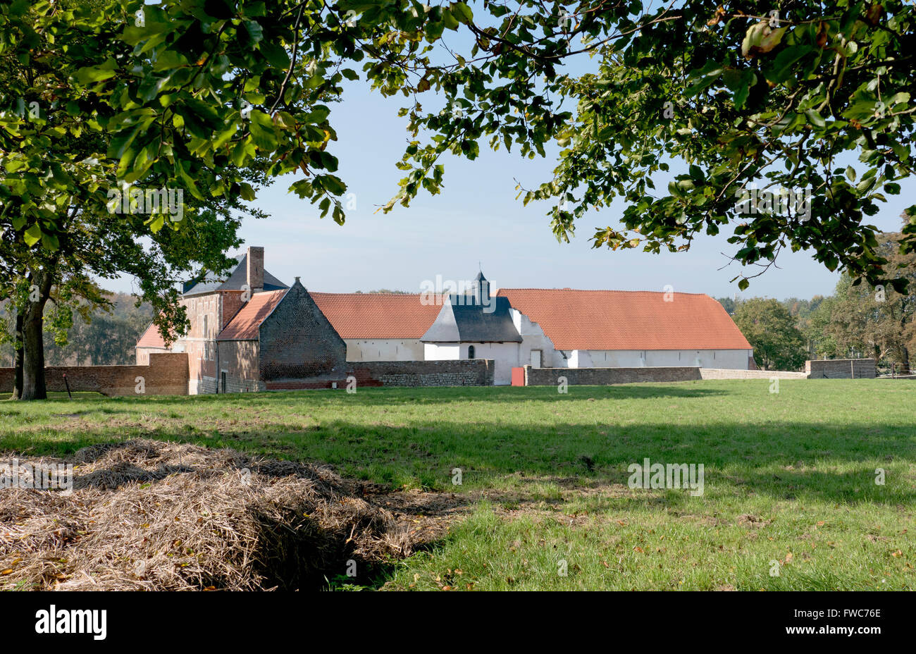 Château d'Hougoumont (originally Goumont) is a large farmhouse situated at the bottom of an escarpment near the Nivelles road in Stock Photo