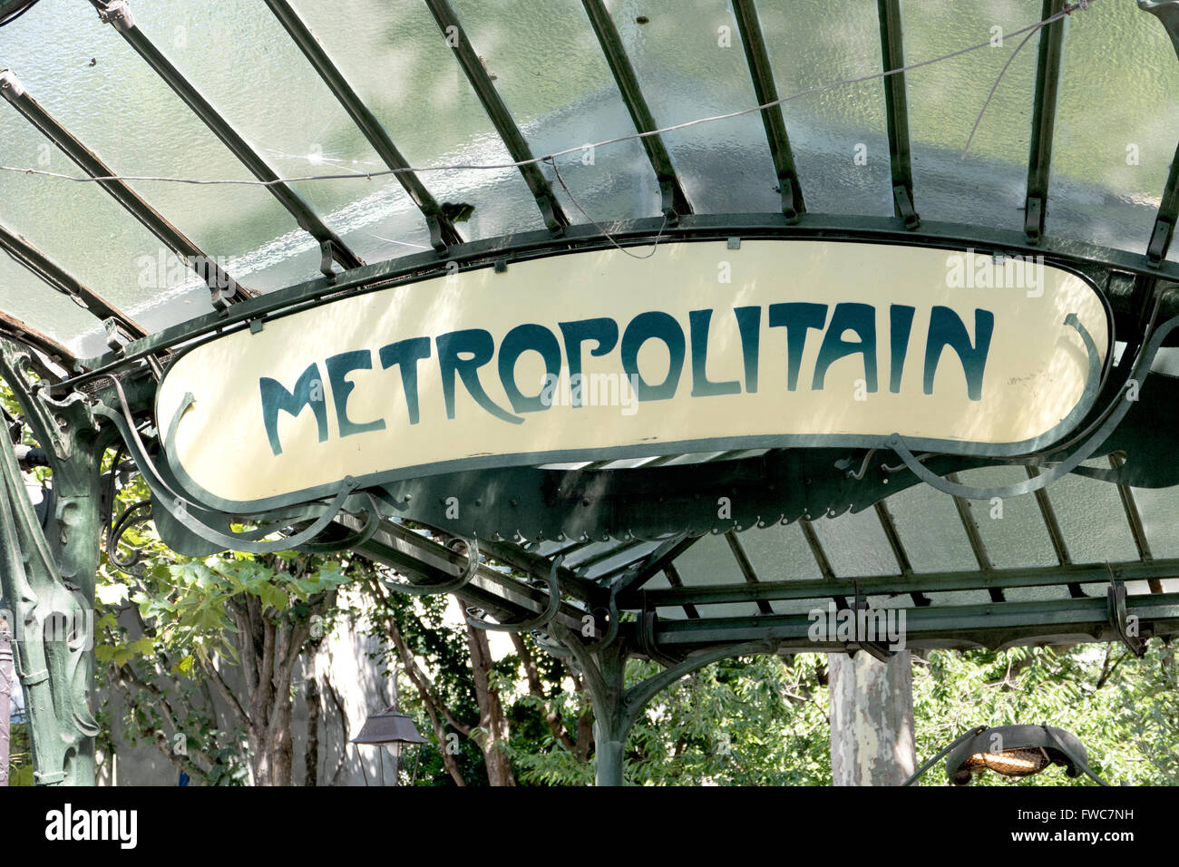 A conserved canopied Art Nouveau metro entrance designed by Hector Guimard, Place des Abbesses, Montmartre, Paris, France. Stock Photo