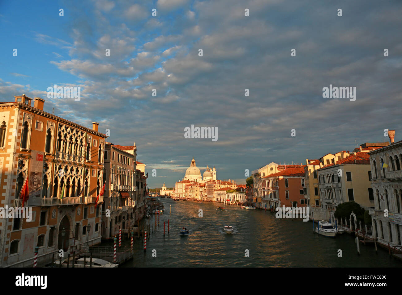 Sunset in Venice. The Grand Canal and Santa Maria della Salute Catholic ...