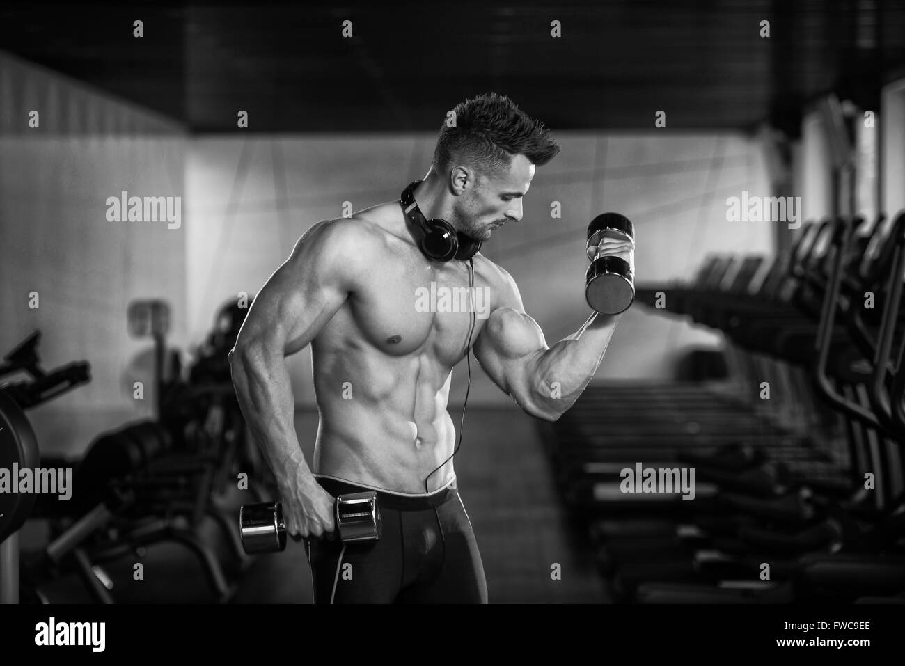 Attractive fit man exercise Black and White Stock Photos & Images - Alamy
