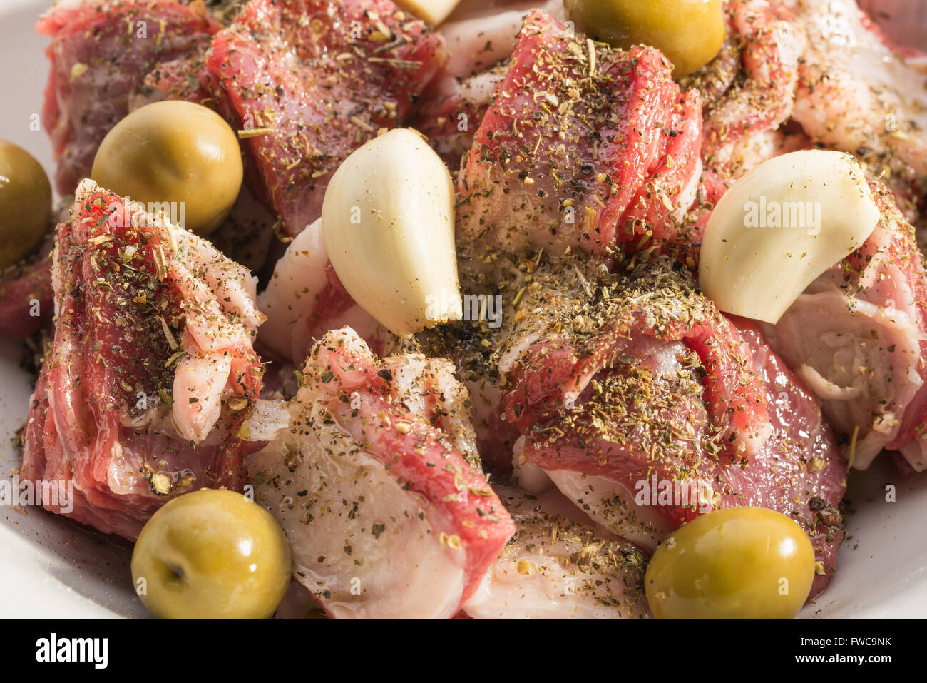 Marinade of lamb stew with herbes de Provence, garlic and olives Stock