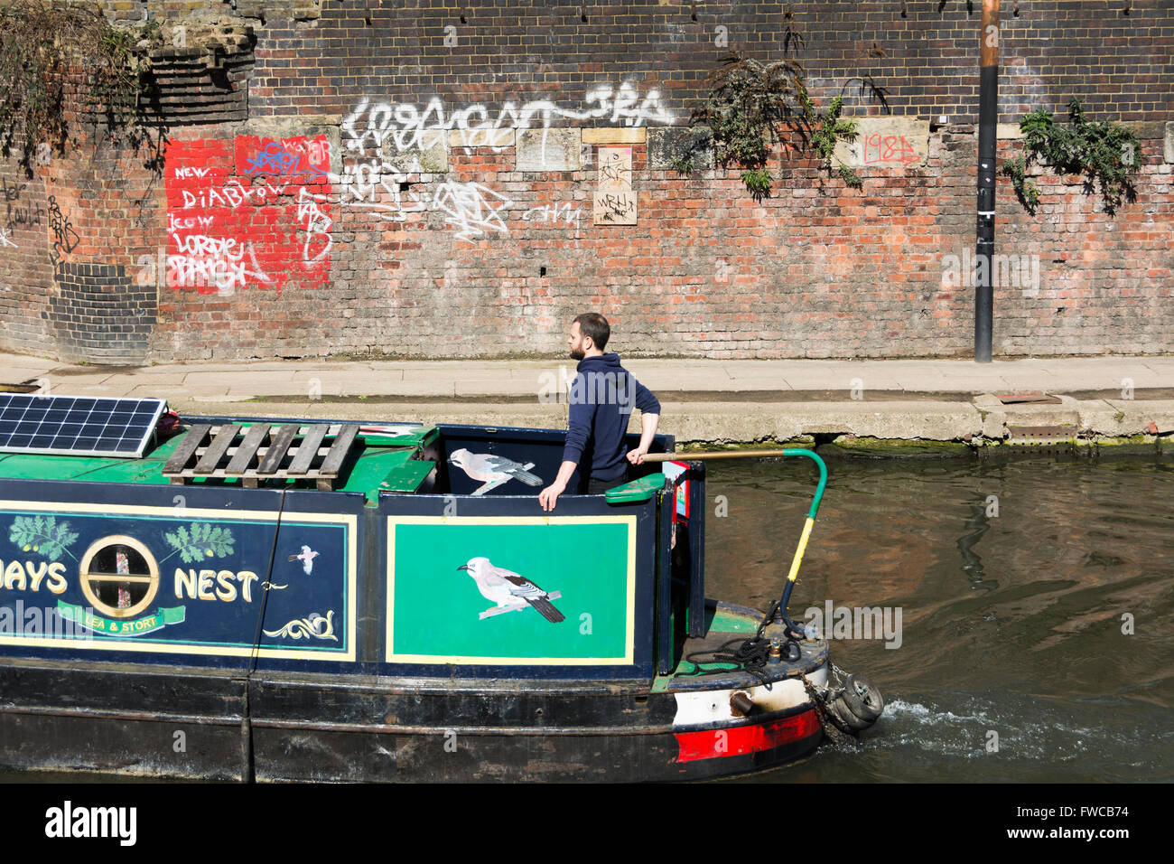 A narrow boat on Regent's Canal in London's King's Cross district, England, UK Stock Photo