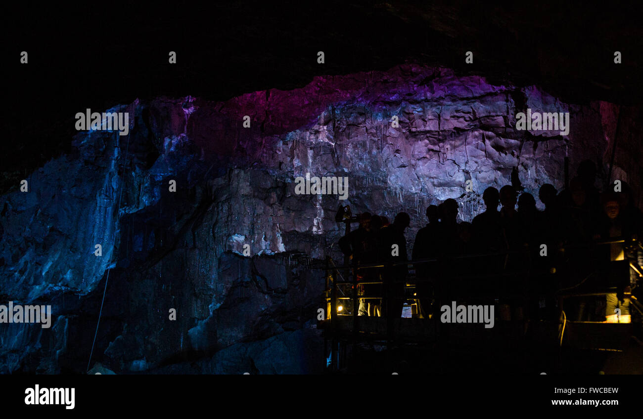 Visitors tour the Battlefield Cavern section of White Scar Cave in the ...
