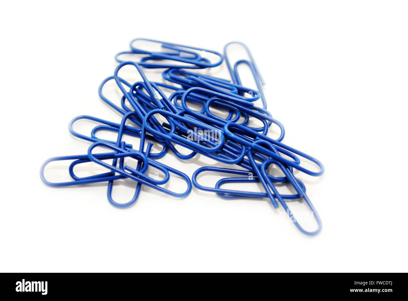 Blue Paper Clips Isolated Over a White Background Stock Photo