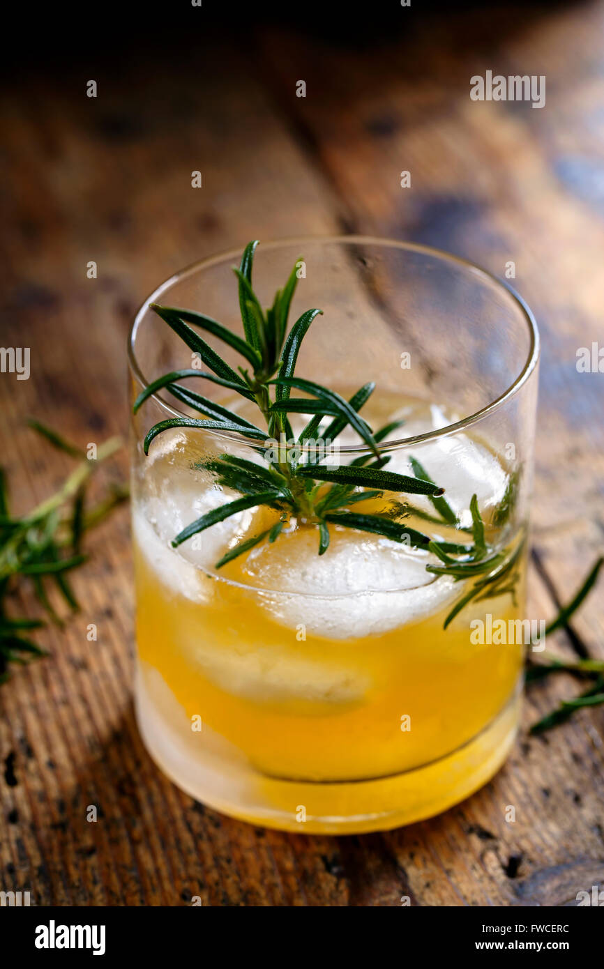 Whiskey sour cocktail with rosemary Stock Photo Alamy