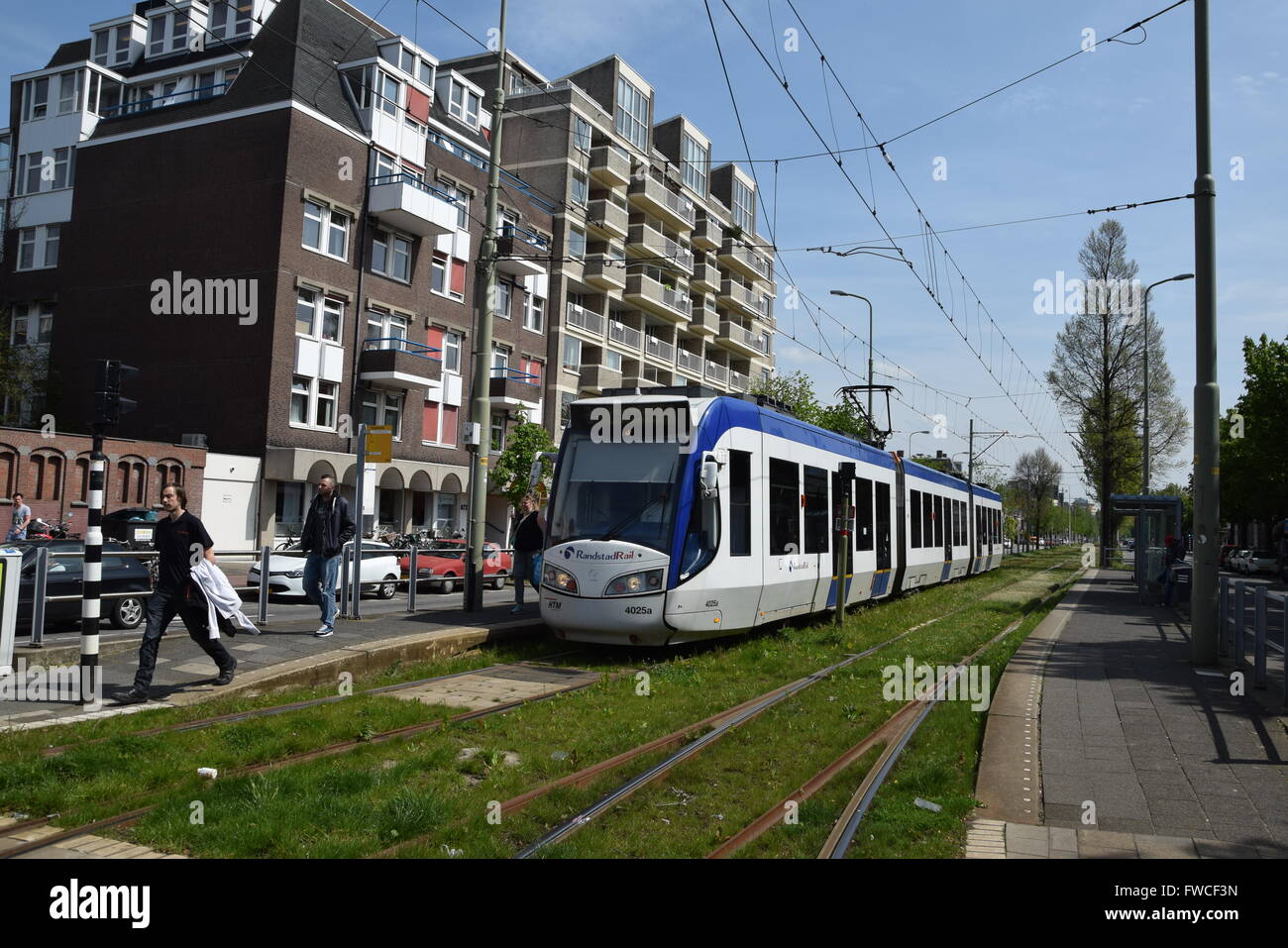 Randstadrail tram at partly grassed segregation of Tram Kon. Emmakade Stock Photo